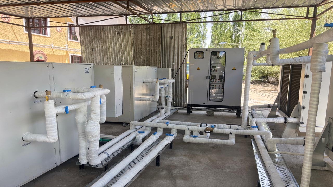 Thiksey plant room showing the glycol side units and electrical control panel under the site canopy